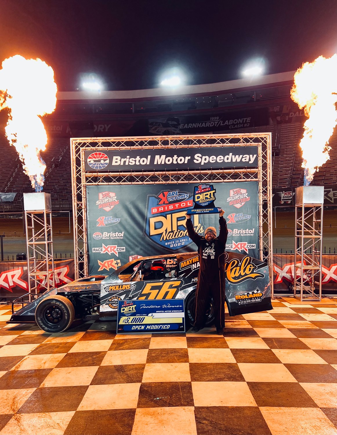 Michael Asberry with the trophy after winning the Bristol Dirt Nationals